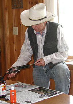 Kari cleaning a 45 pistol