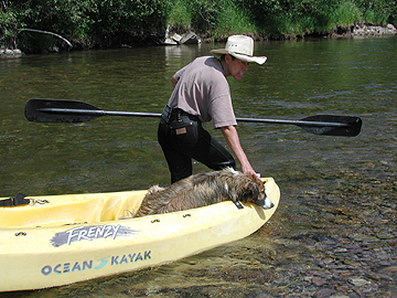 Sage relaxes in sit on top kayak