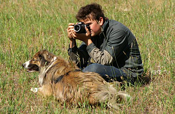 Tim shooting pictures instead of a gun