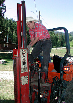 pulling post driver springs into place